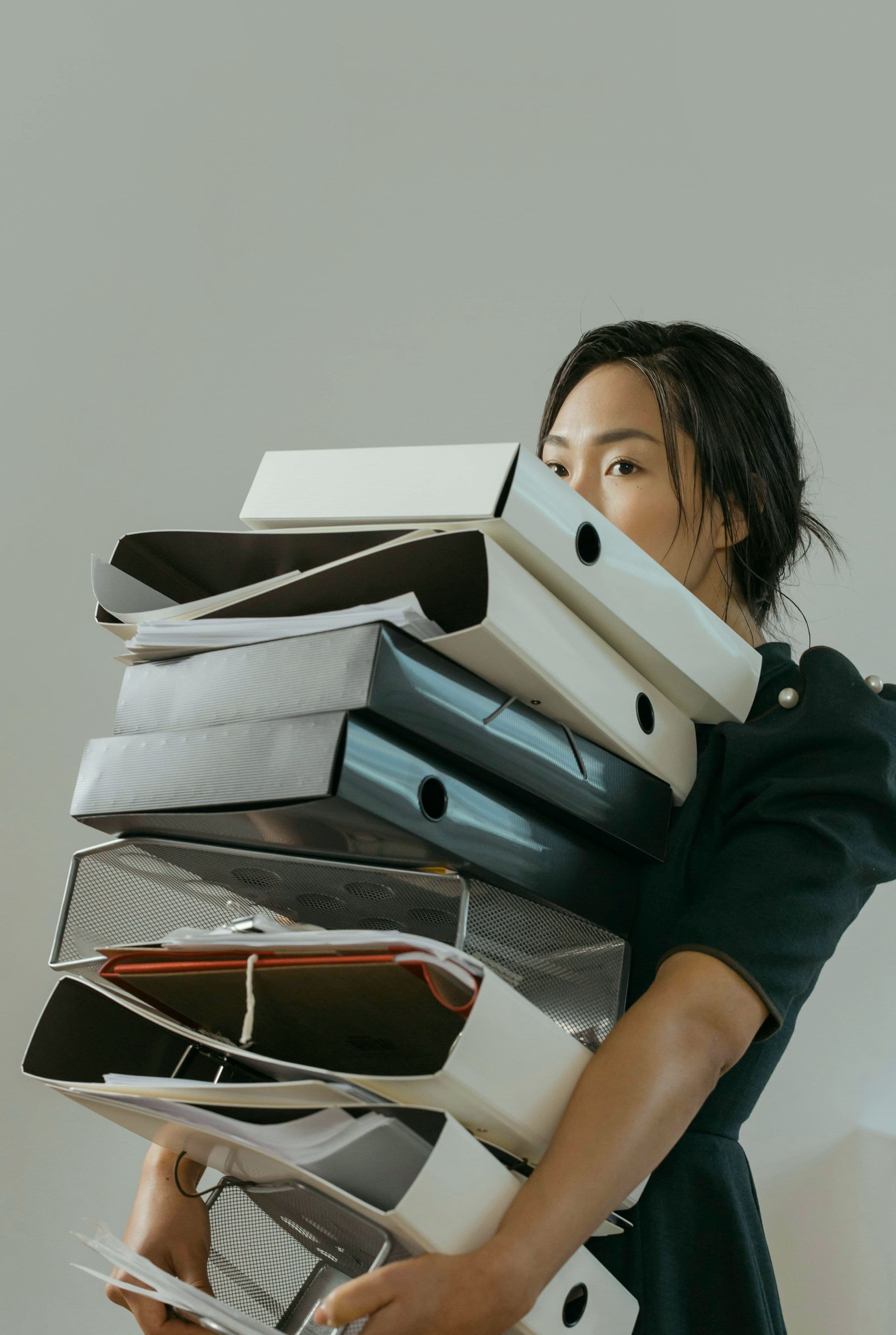 woman carrying books